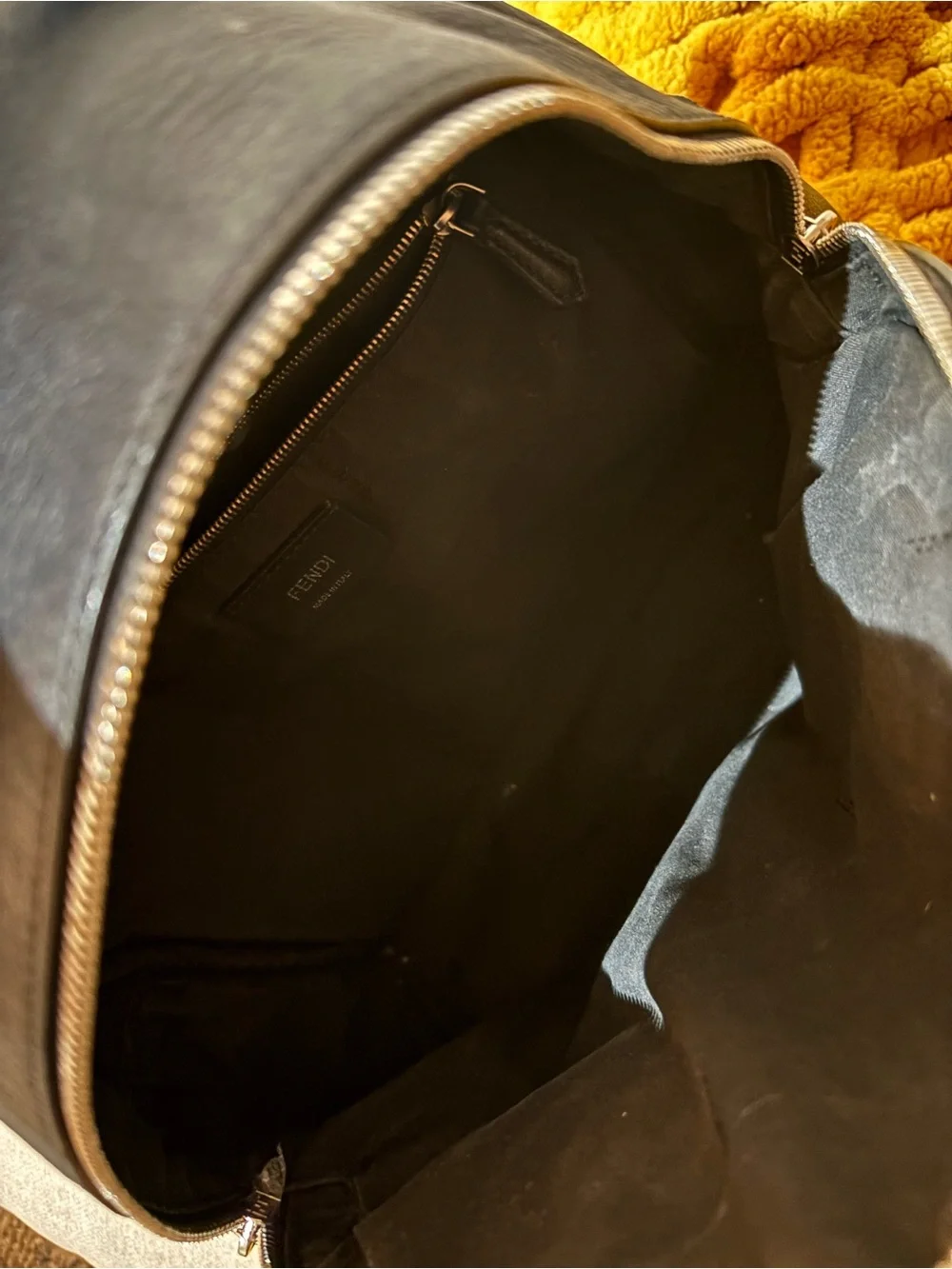 Fendi Black Backpack with Yellow Fur Eye Accents